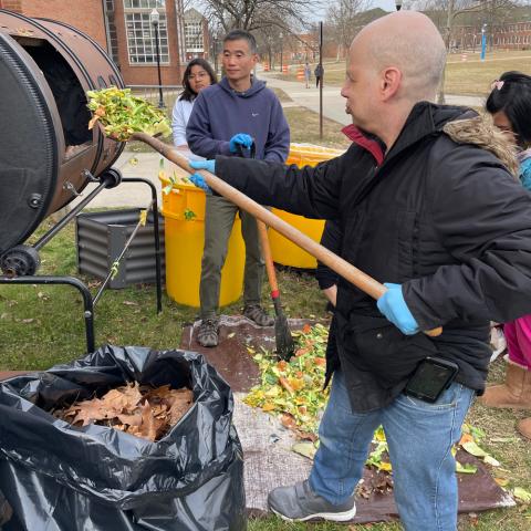 Students are filling up the new composter at 6S